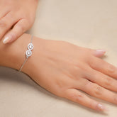 Sparkling Dual Oval Silver Bracelet with Premium White Stones