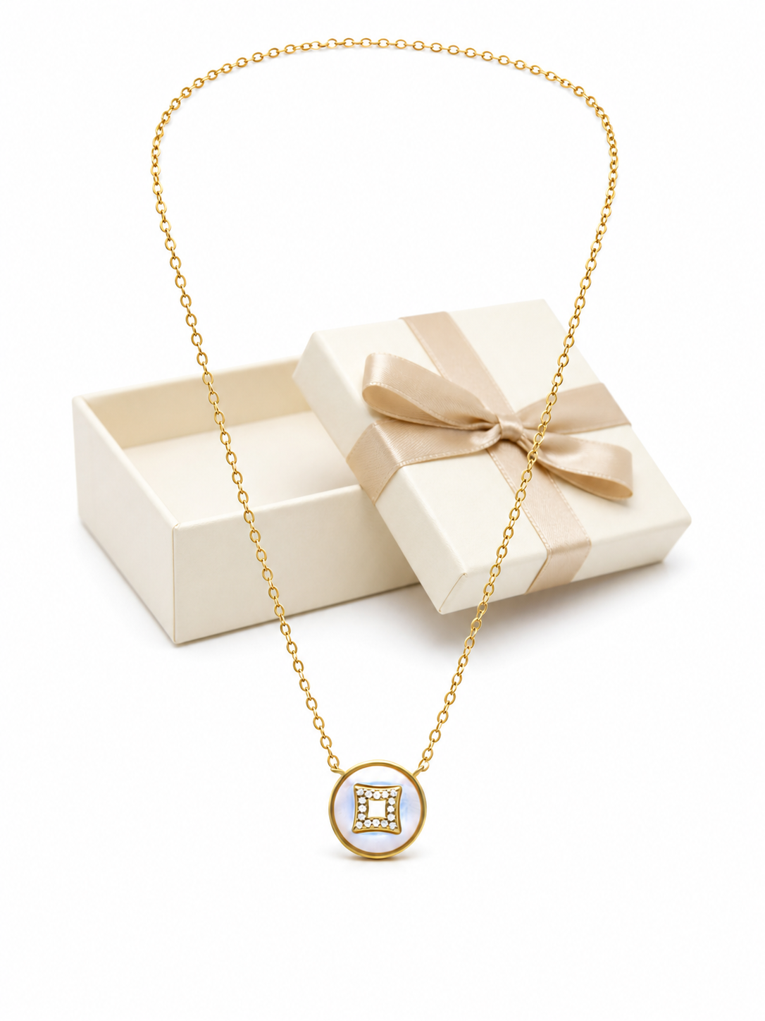 Zircon Dream pendant displayed with a decorative gift box on a white background