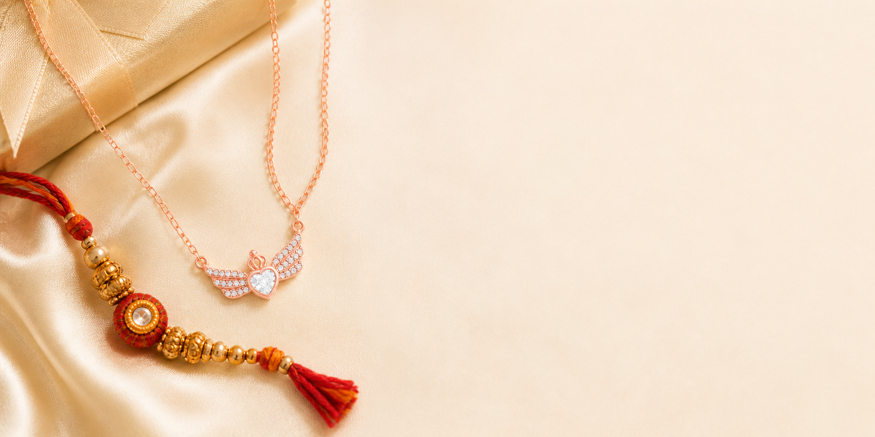 Rose gold heart and crown necklace styled with an elegant Rakhi thread