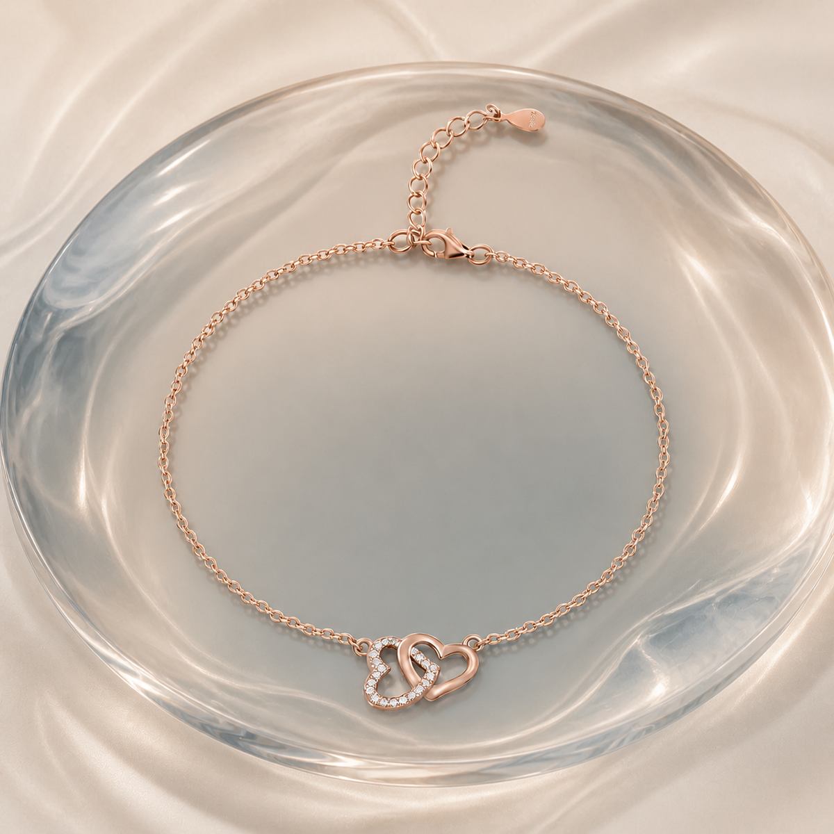 Rose gold finish silver bracelet on mineral tinted glass